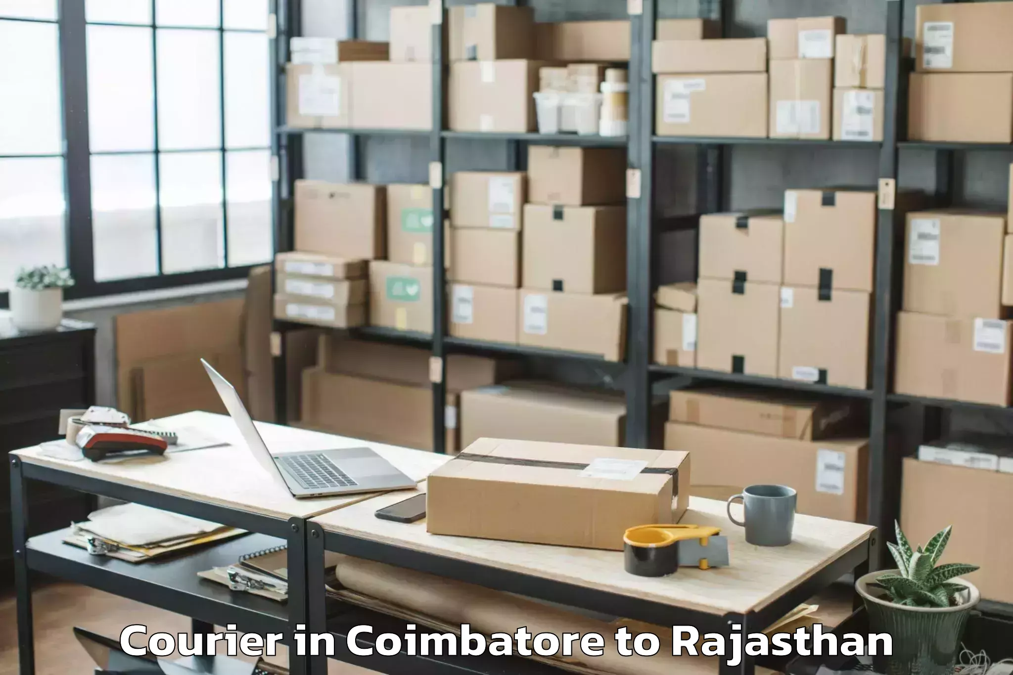 Reliable Coimbatore to Jaipur National University Jai Courier